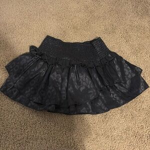This is a black skirt from DO+BE, size M